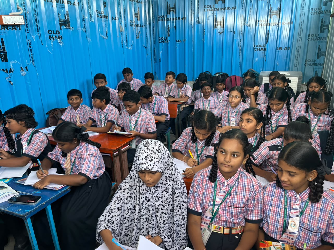 Students taking part in a hands-on learning session inside the Nxtera 21C Lab